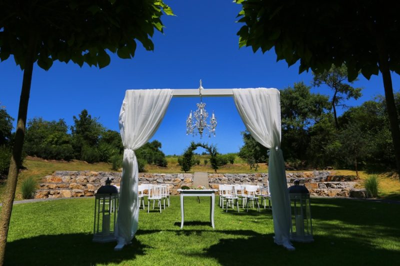 Wedding ceremony set up with chandelier outside