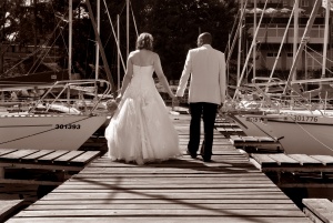 Martina and Andrew walking down the pier